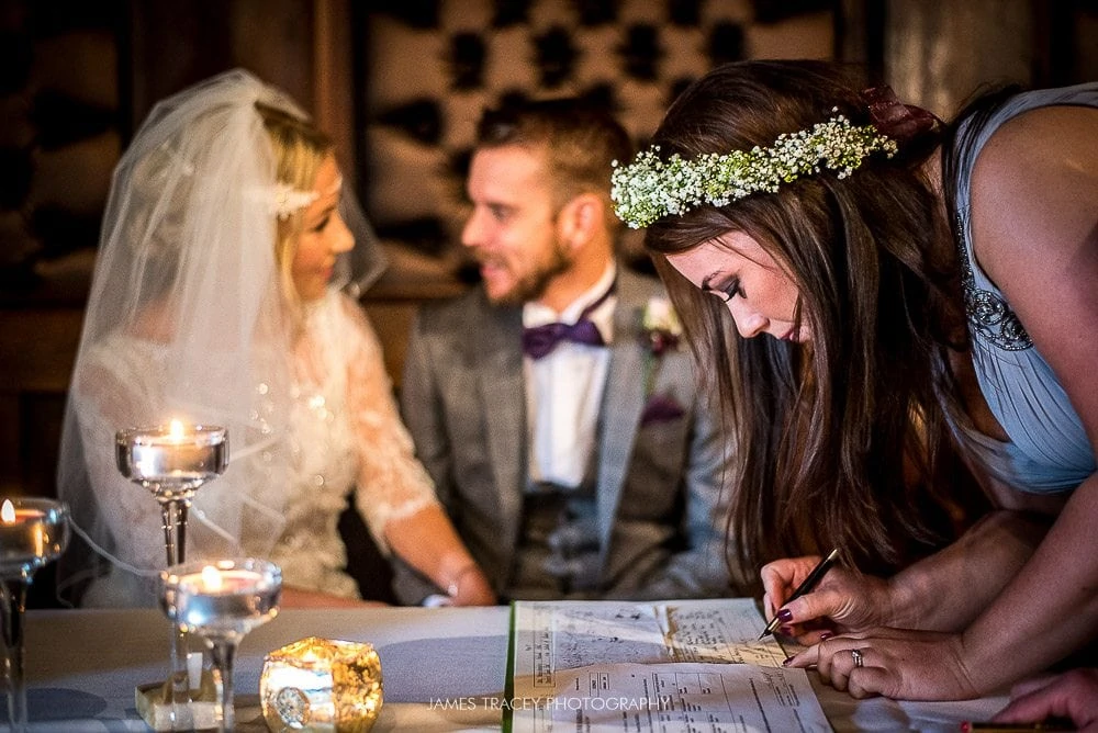 bridesmaid signing regsiter