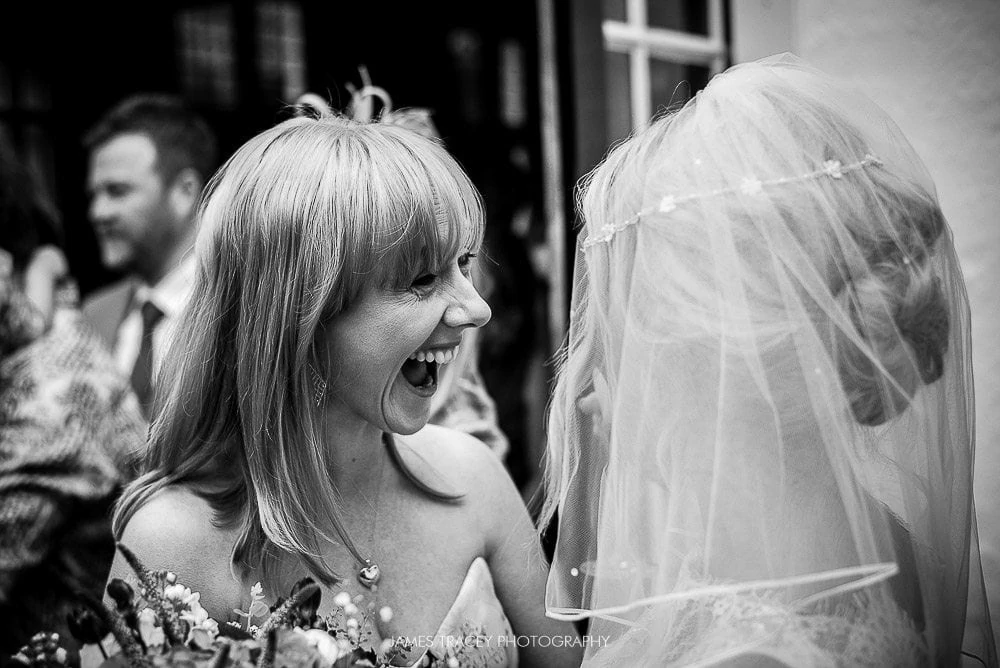 laughing wedding guest