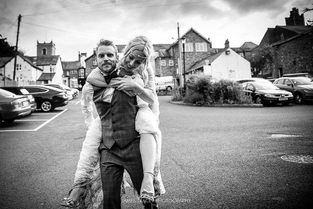 bride having a piggy back