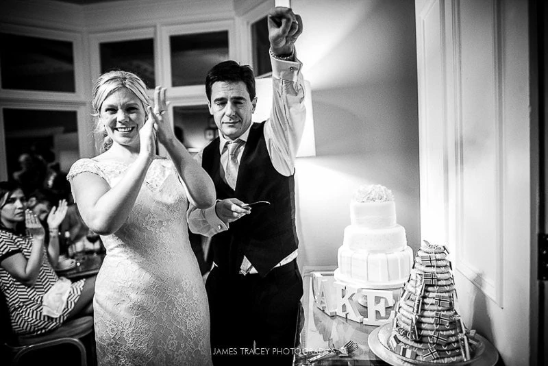 wedding cake being cut