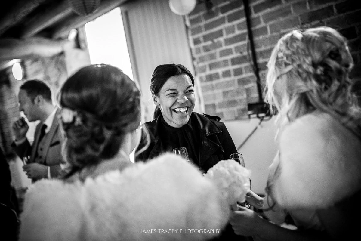 laughing wedding guest at pimhill barn