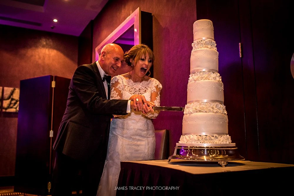 cutting wedding cake at chester grosvenor