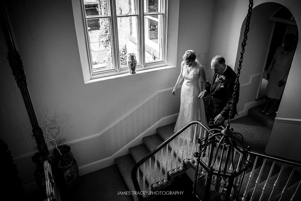 walking to wedding down stairs