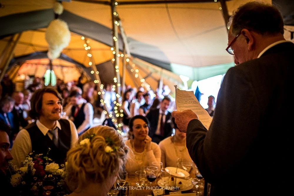 wedding guests watching speech