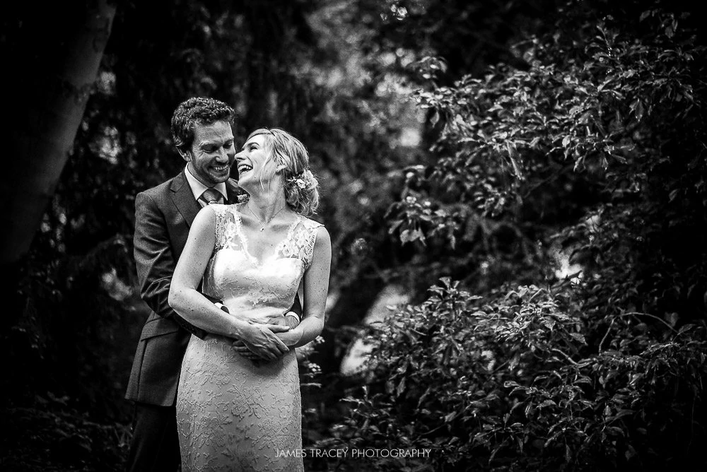 bride and groom smiling