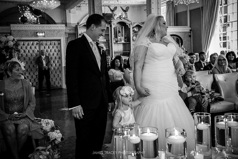 bride groom and their daughter