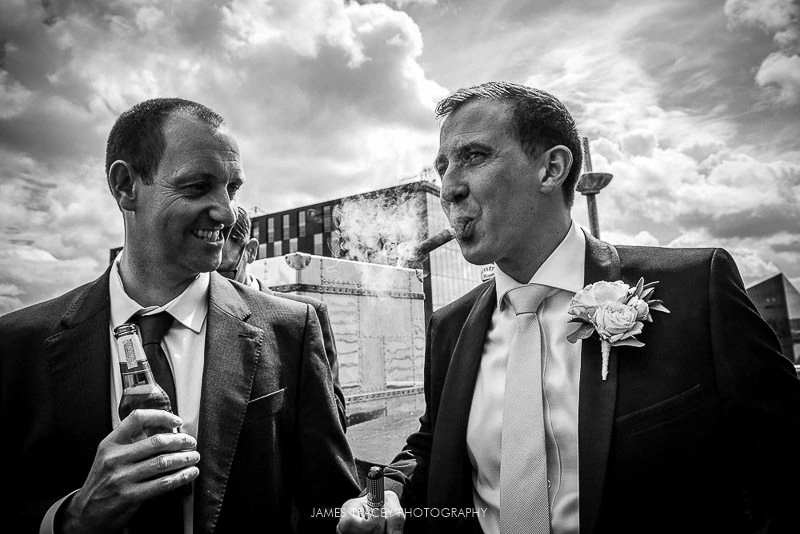 groom smoking a cigar