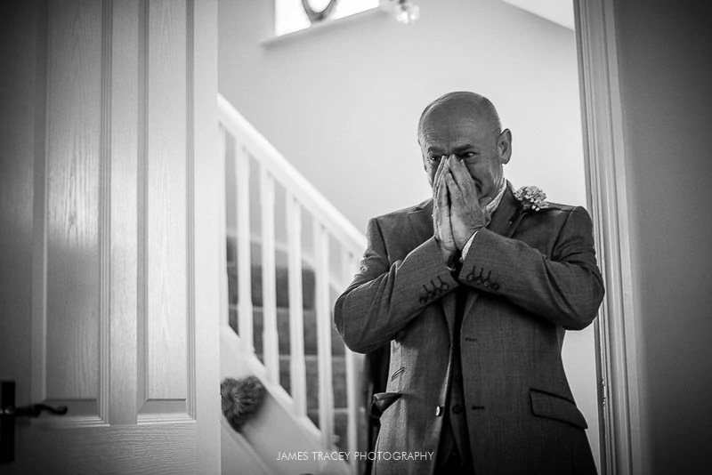 father of the bride holding tears back