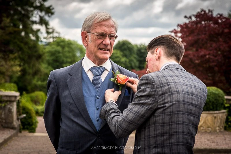 fatherof the bride having flower added