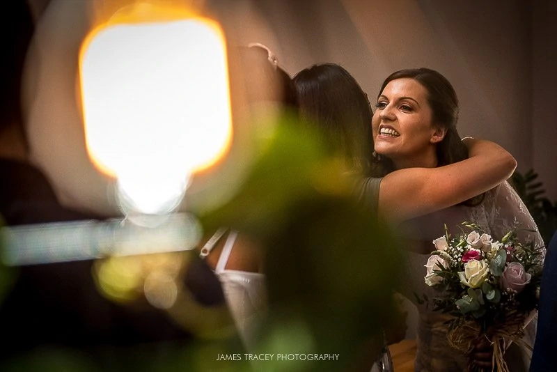 bride hugging her friends