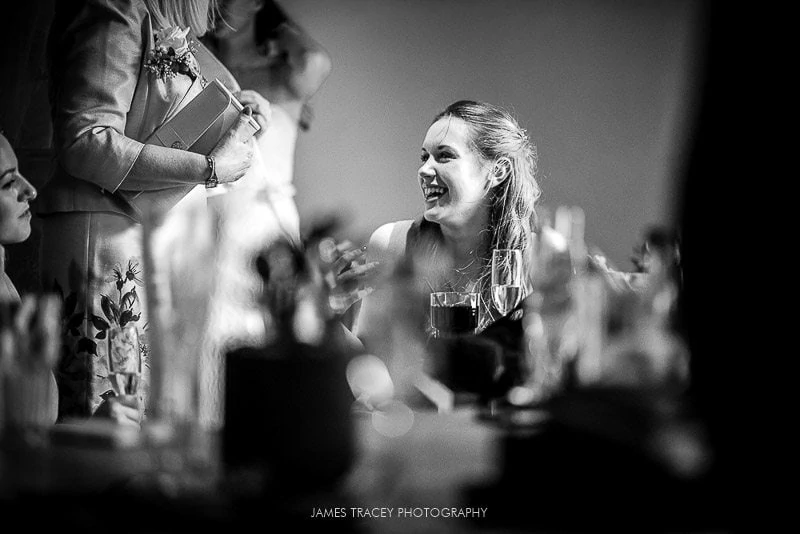 wedding guest laughing