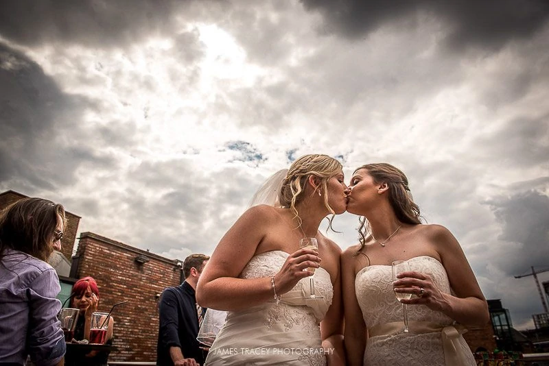 brides kissing