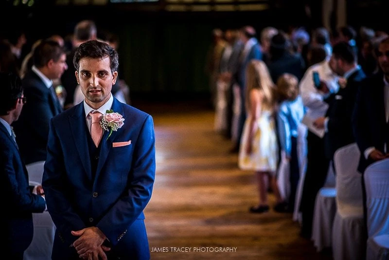 groom waiting for bride