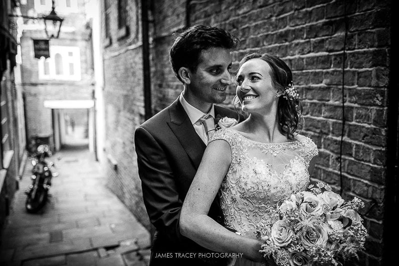 bride and groom posing