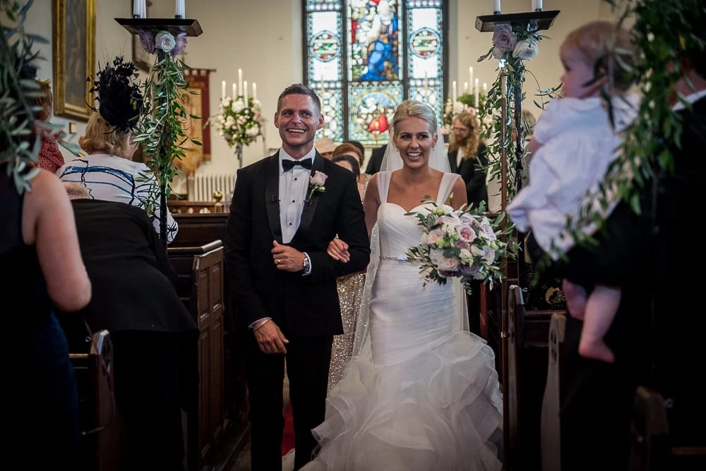 walking back down the aisle at church wedding