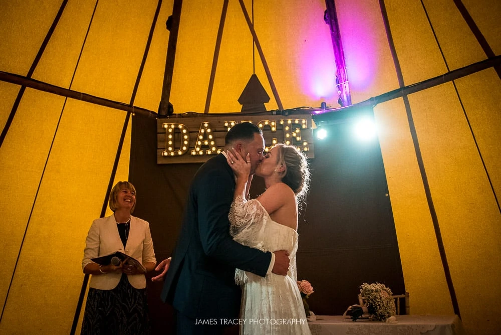 wedding kiss at hidden river cabin