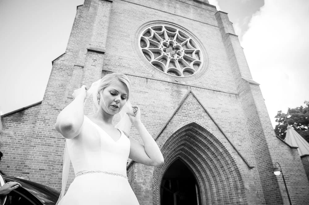 bride arriving at church in hale barns