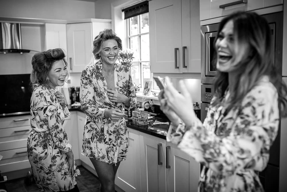 bridesmaid sharing a joke