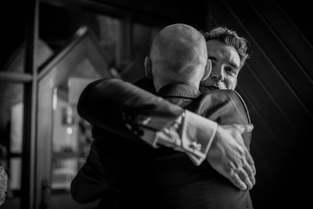 big hugs ata church wedding