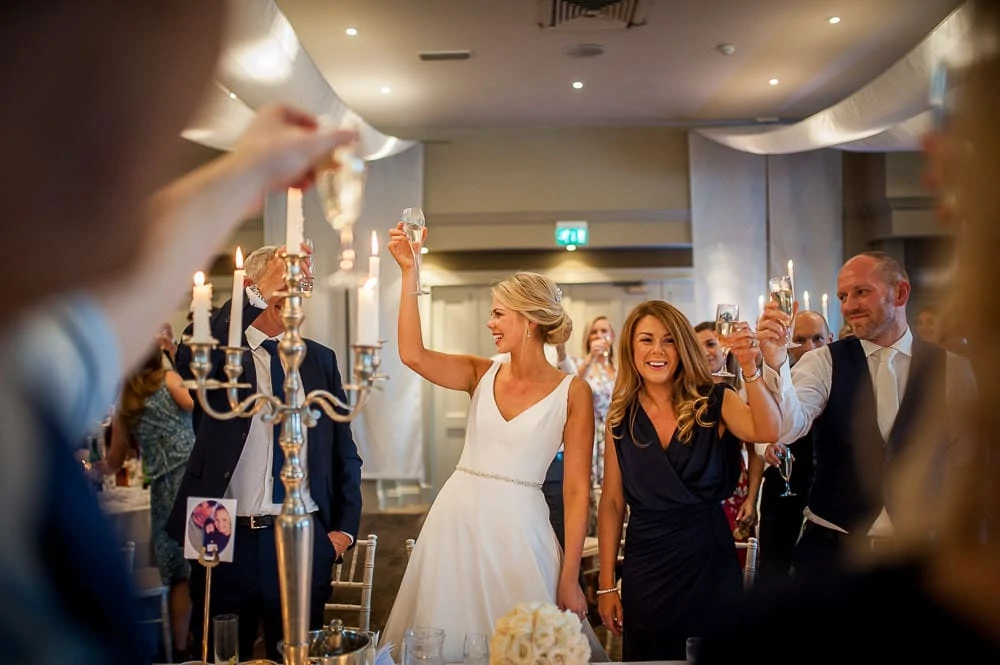 bride toasting her husband