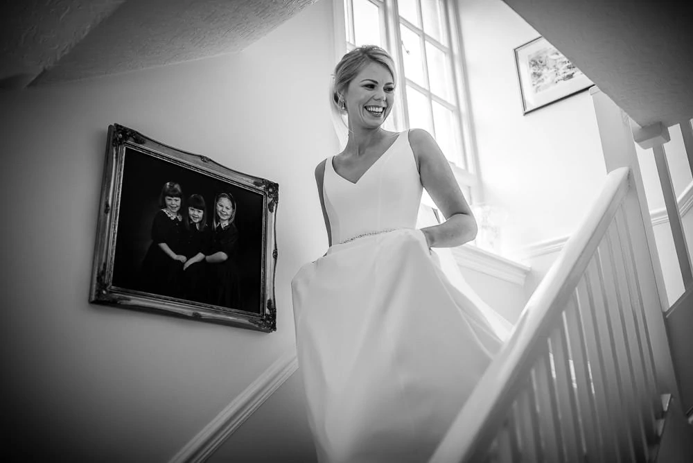 bride wlaking down the stairs