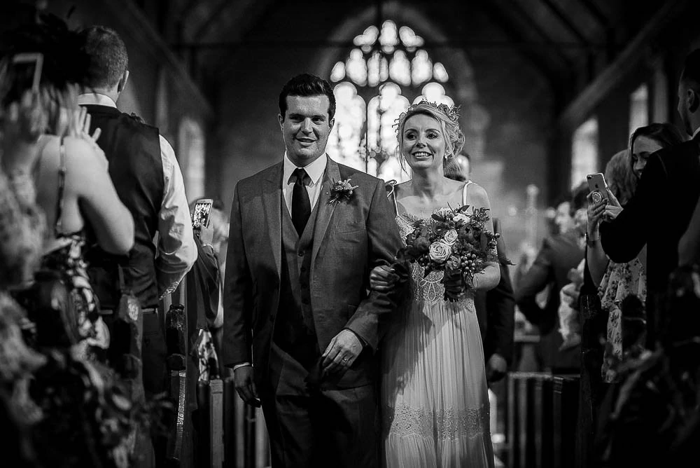 walking back down the wedding aisle