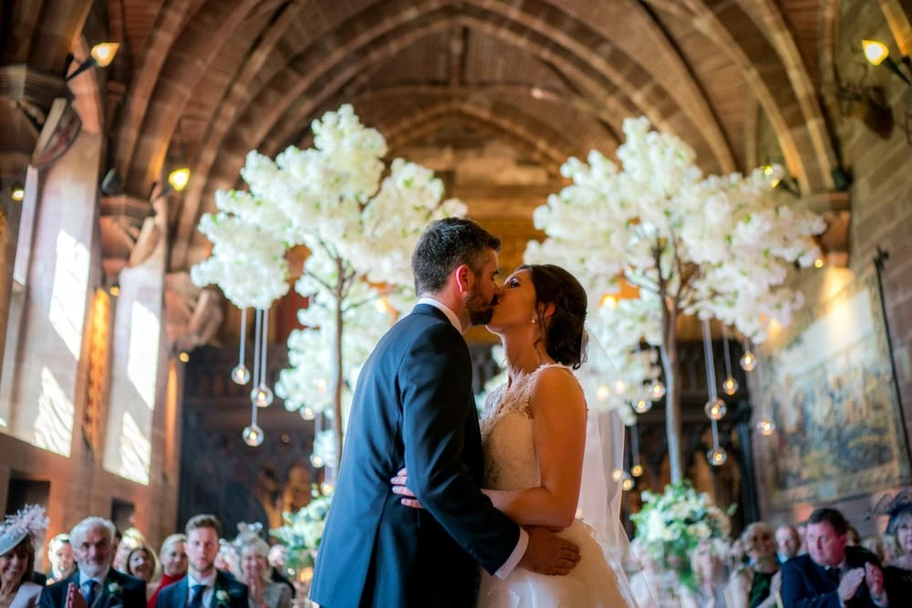 first kiss at Peckforton Castle Wedding