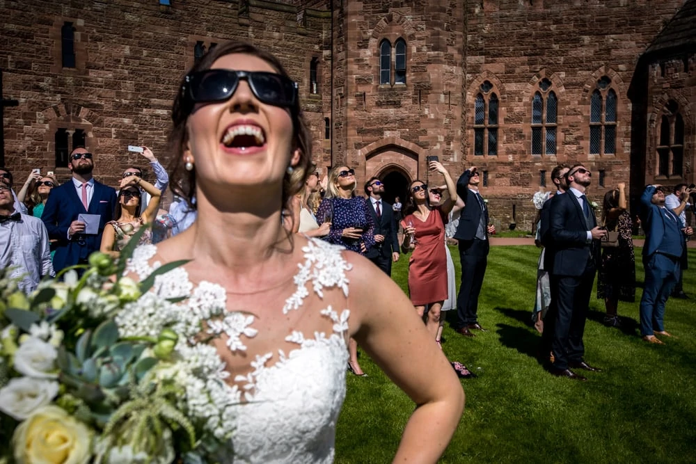 bride in sunglasses at Peckforton Castle Wedding