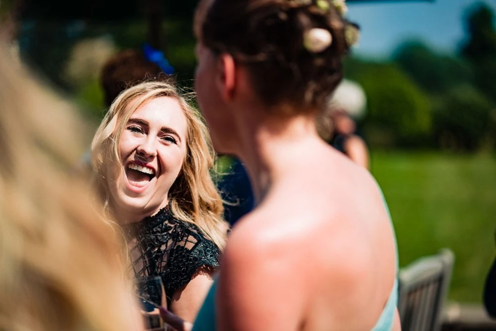 laughing wedding guest