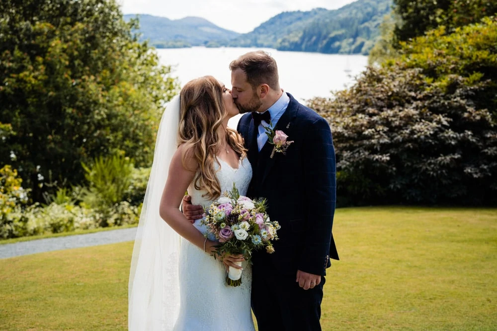 wedding couple in front of windermere