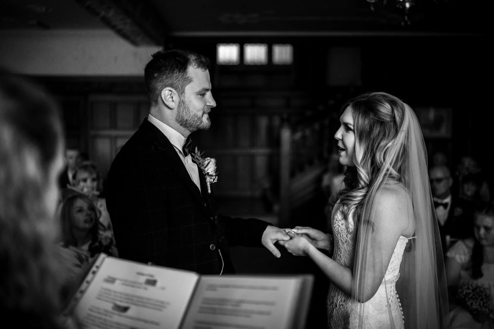 exchange of wedding rings at cragwood