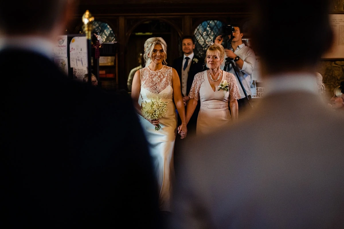 bride walking up the ailse