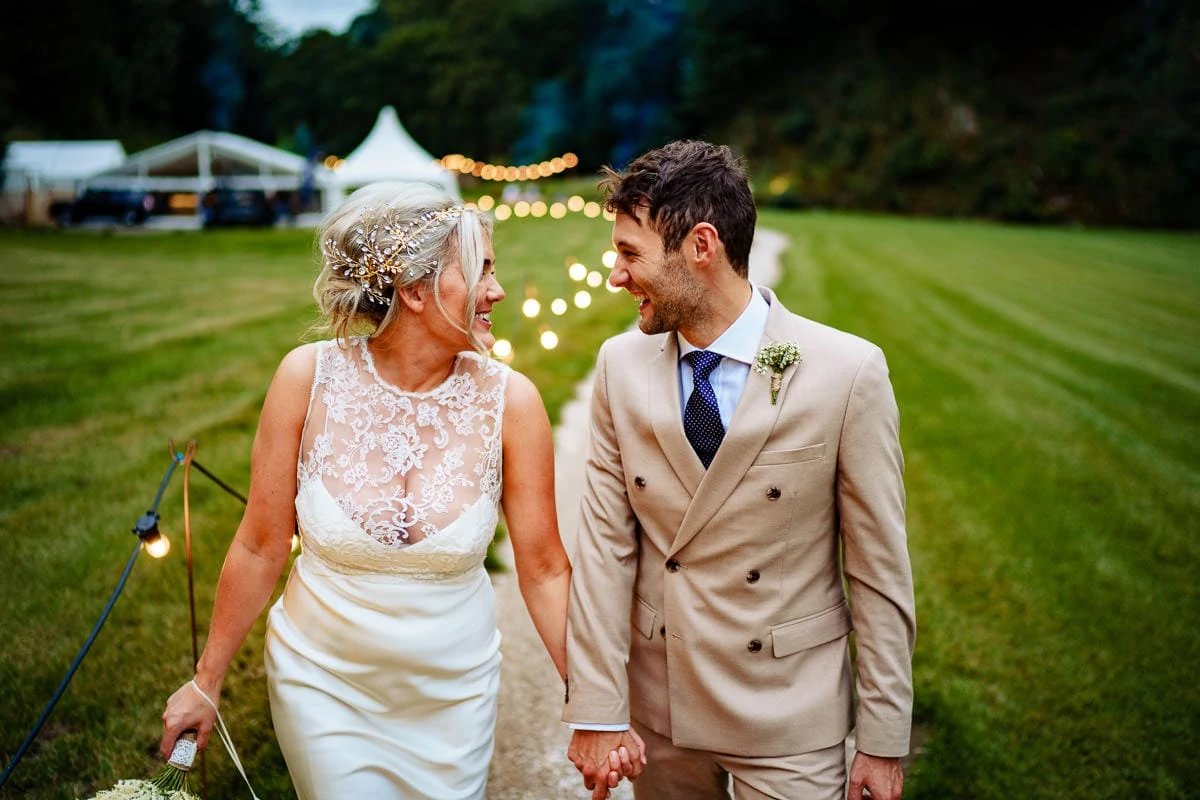 gisburn park estate couple walking and laughing