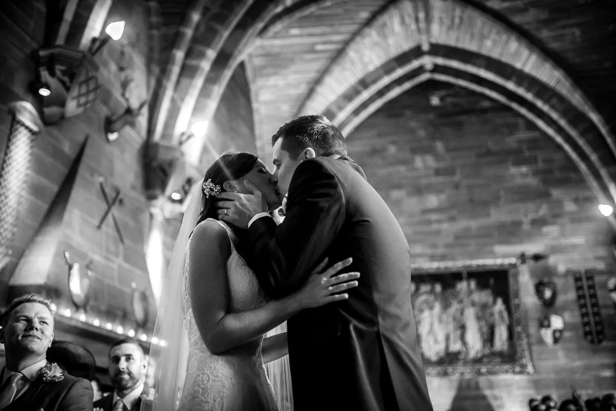 first kiss at peckforton castle wedding