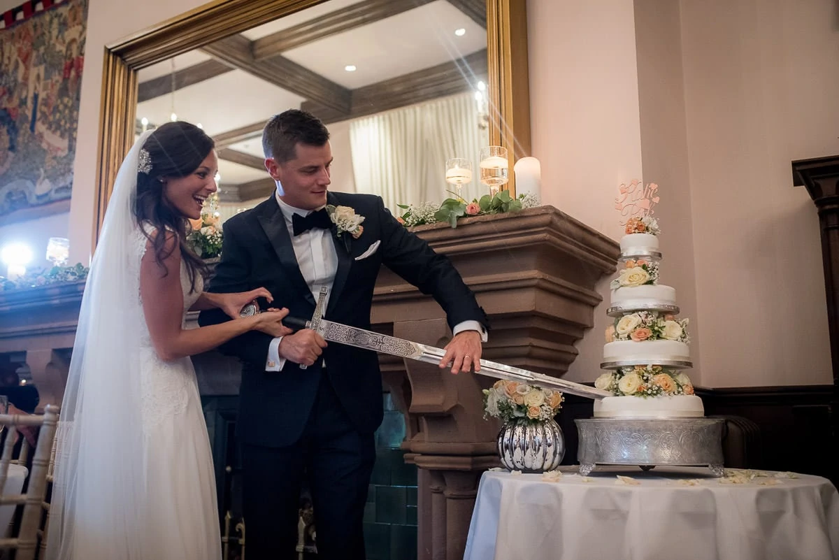 cake cutting at peckforton castle