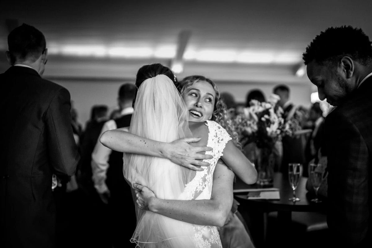 bride being hugged at colshaw hall
