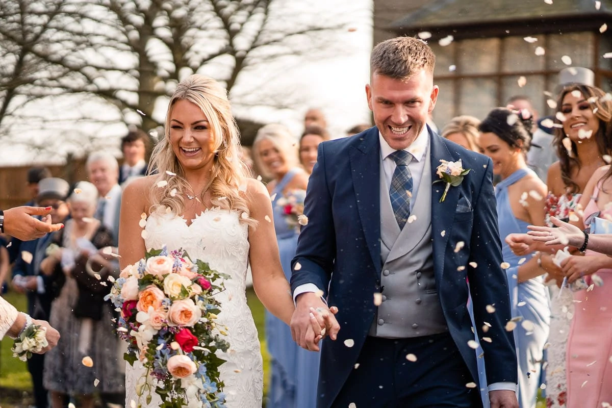 confetti outside church wedding