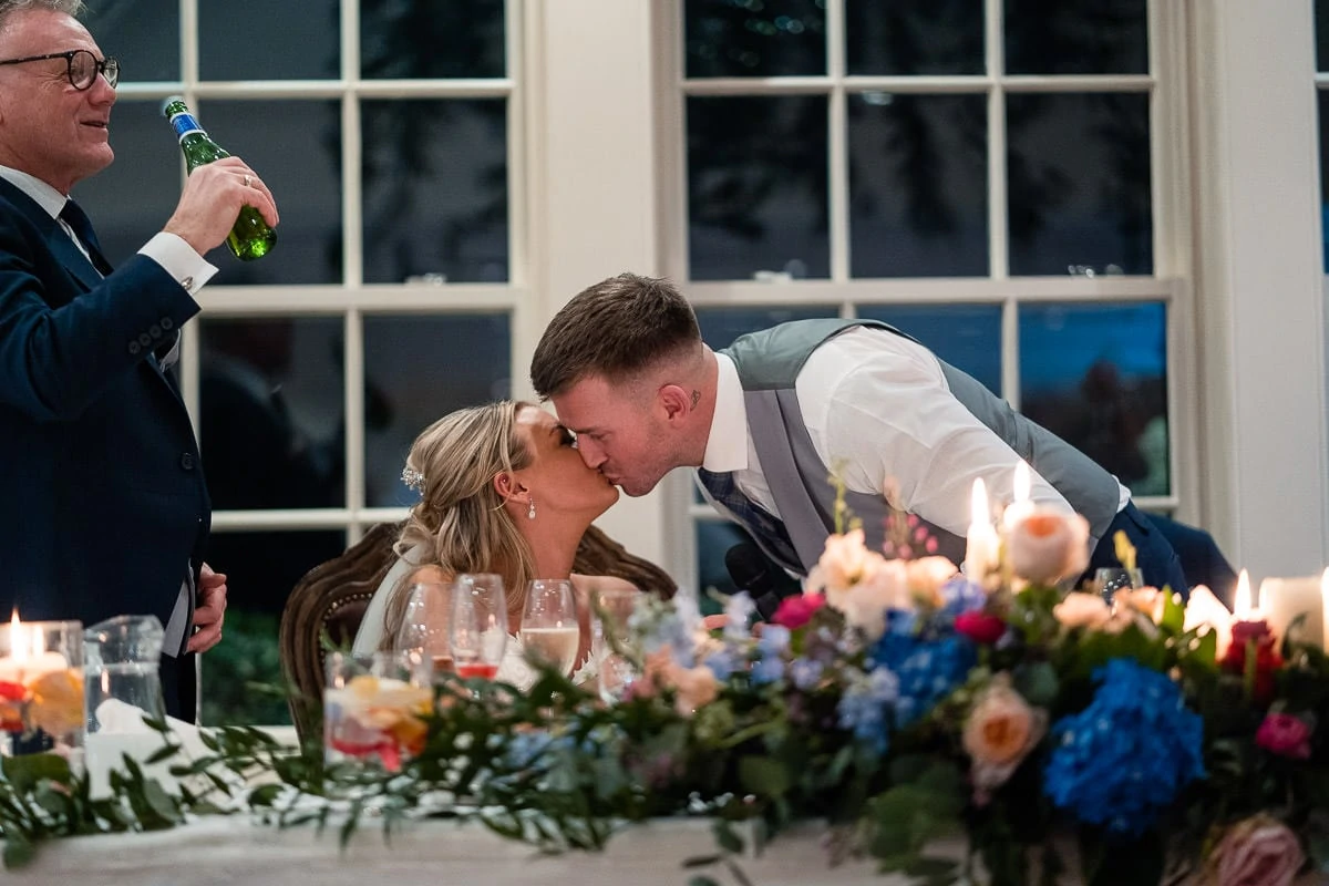 bride and groom kiss