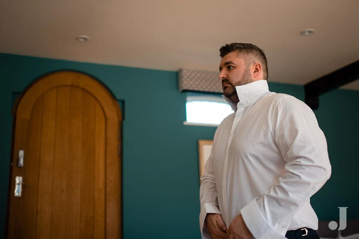 groom getting ready at Colshaw Hall