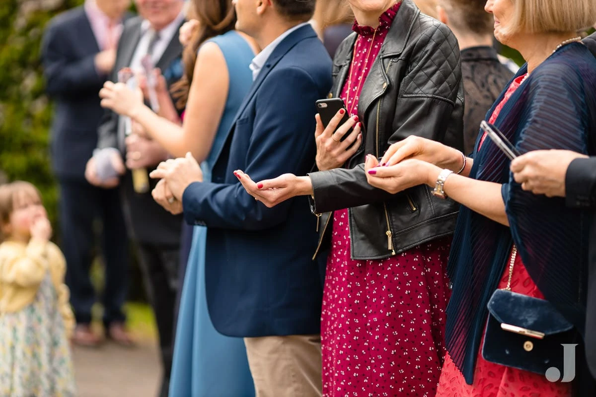 guests holding confetti