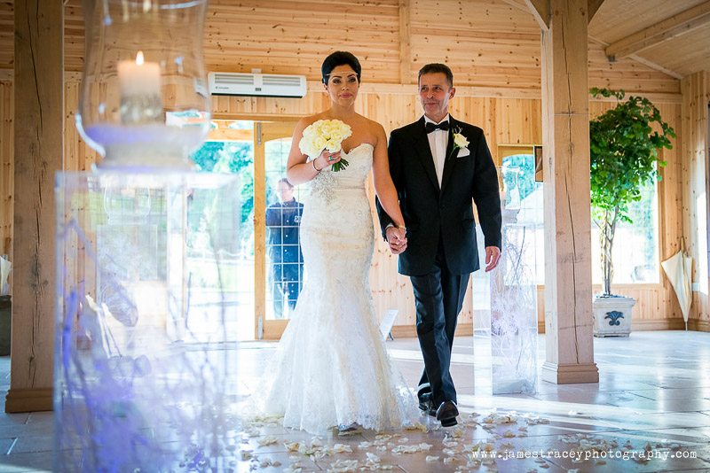 bride walking up the aisle at Colshaw Hall in Cheshire