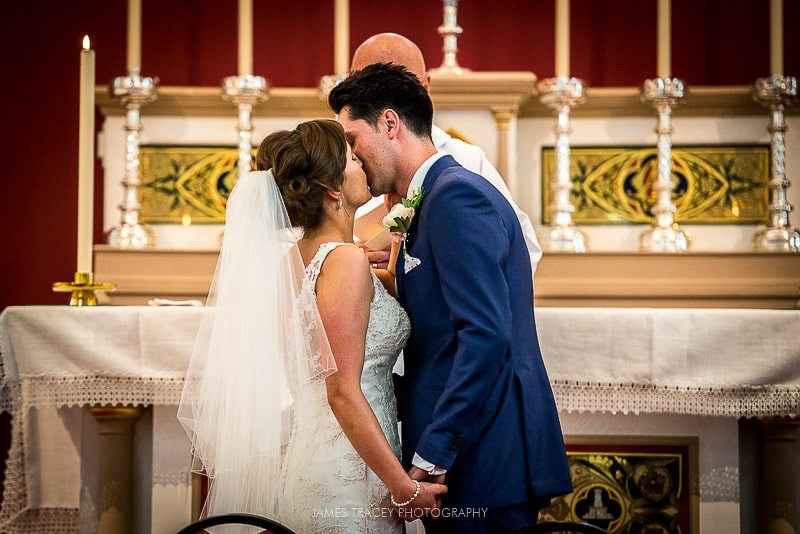 bride and groom first kiss merewood hotel wedding