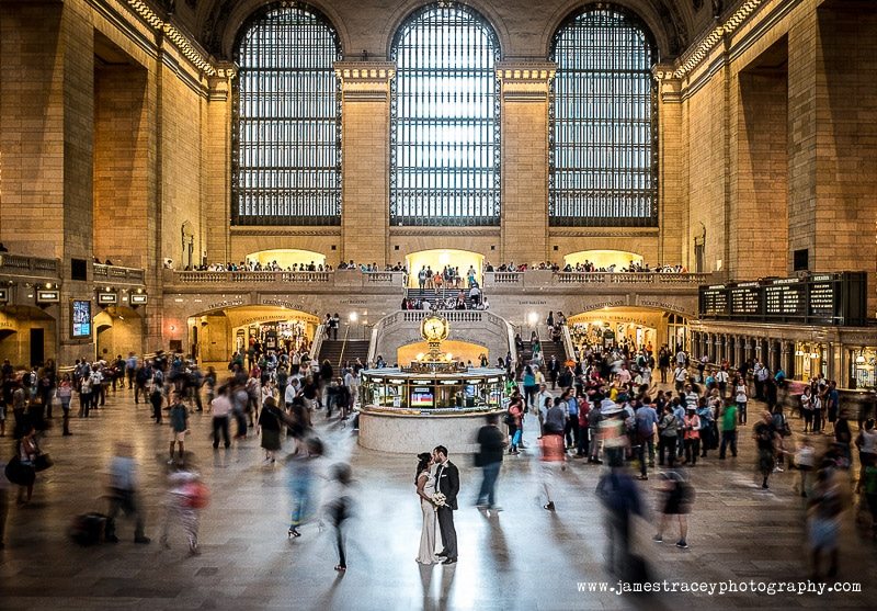 bride and groom on the concourse of grand central terminal in new york city