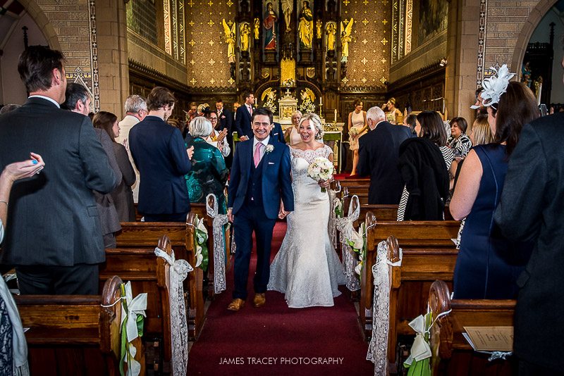 bride and groom leaving church