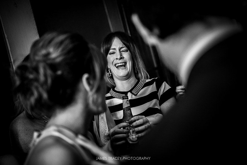 wedding guest laughing