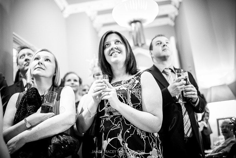 guests laughing at a wedding