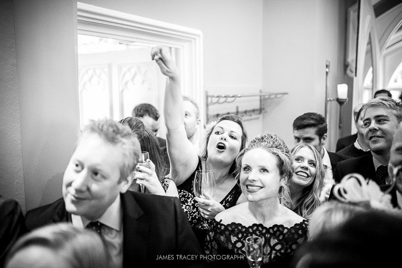 wedding guests laughing at speeches