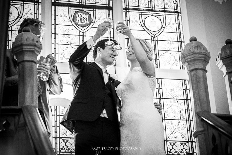 bride and groom toasting at a wedding