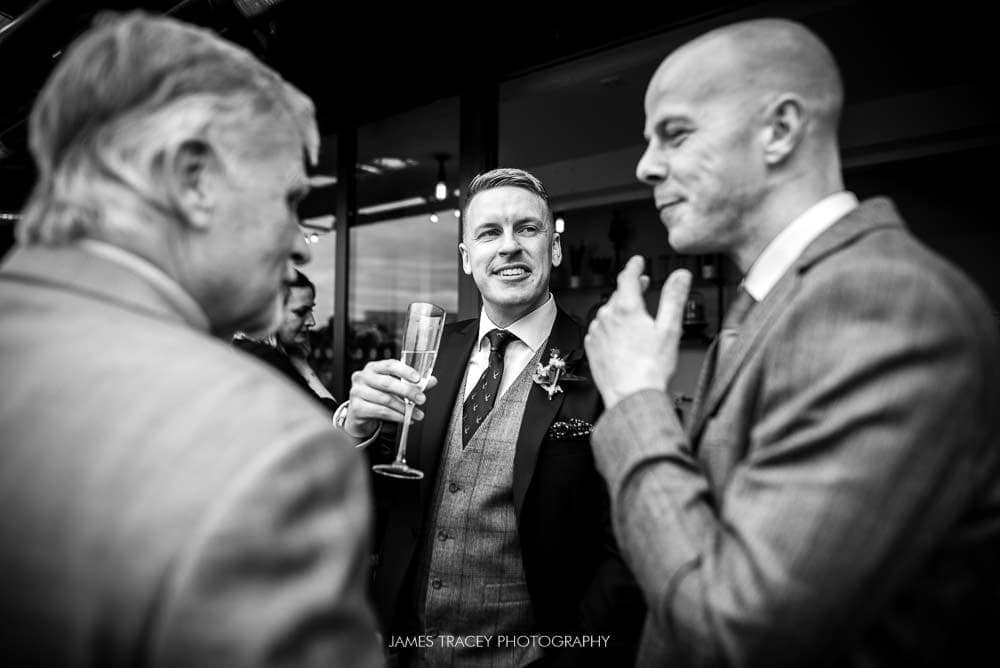 groom chatting at king street townhouse