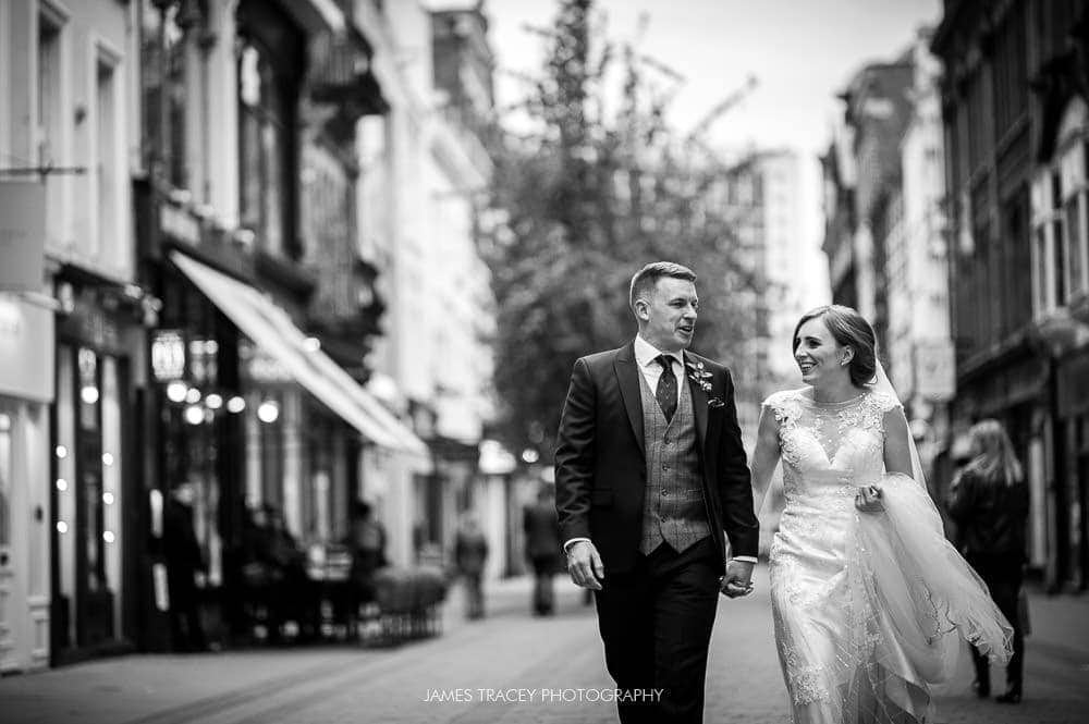 bride and groom on king street manchester